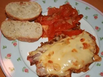 Rezept: Schnitzel mit Parmaschinken und zerlaufenem Käse an Tomaten Bild Nr. 3 Schnitzel mit Parmaschinken und zerlaufenem Käse an Tomaten - Rezept - Bild Nr. 3