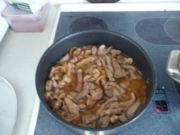 Geschnetzeltes mit Reis und Gurkensalat - Rezept