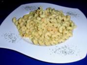 Nudeln tauchen in Tiefseegarnelen-Sahne-Ananas-Curry-Soße - Rezept