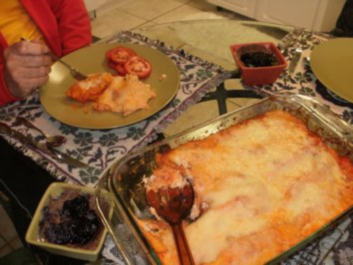 Bilder für Huhn - Gebackene Enchiladas mit Huhn und Kaese - Echt Amerikanisch mit Mexicanischen Geschmack- Ein gutes Familien Essen - Rezept