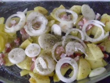 Deftiger Kartoffel-Auflauf ~ Hühnerschenkel ~ Erbsen - Rezept - Bild Nr. 4