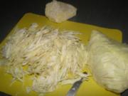Spitzkohl mit Kartoffelpüree und Pilze untereinander, dazu Putenschnitzel   (Fotos) - Rezept
