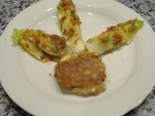 Ziegenkäse mit Zucchini,Walnuß-Parmesankruste und Salatherzen - Rezept
