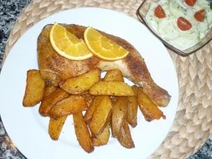 Rezept: Orangenhähnchen mit Kartoffelachteln Orangenhähnchen mit Kartoffelachteln - Rezept