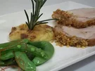Rücken vom Mangalica-Schwein an Dauphinoise und Erbsenschoten - Rezept