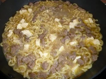 Rezept: Rinderbrühe mit Einlage Rinderbrühe mit Einlage - Rezept