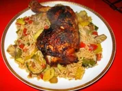 Hähnchenkeule gegrillt auf buntem Gemüsereis - Rezept