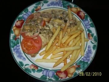 Gratinierte Champignon-Putenschnitzel mit Gouda - Rezept