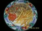 Gratinierte Champignon-Putenschnitzel mit Gouda - Rezept