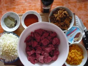 Rotweinrindergulasch mit Pfifferlingen und Kumquats - Rezept - Bild Nr. 3