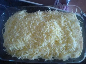 Überbackenes Putenschnitzel - Rezept