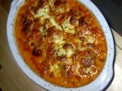 Orientalische Hackbällchen in Tomatensoße mit Mozarella überbacken - Rezept