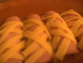 Rezept: Schinkenröllchen mit Mozarella-Füllung und Käsehülle Bild Nr. 2 Schinkenröllchen mit Mozarella-Füllung und Käsehülle - Rezept - Bild Nr. 2