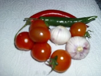Rezept: Chillischarfe Coktailtomaten Süß-Sauer mit Knoblauch Bild Nr. 2 Chillischarfe Coktailtomaten Süß-Sauer mit Knoblauch - Rezept - Bild Nr. 2