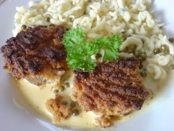 Rezept: Schweinemedaillons mit Orangeat-Kruste und Pfeffer-Rahmsoße Schweinemedaillons mit Orangeat-Kruste und Pfeffer-Rahmsoße - Rezept