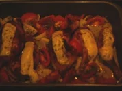 Hühnerschenkel überbacken, mit Tomaten u. Ingwer - Rezept