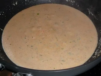 Pangasiusfilet in Tomaten-Kräutersauce auf Reisbett - Rezept - Bild Nr. 3