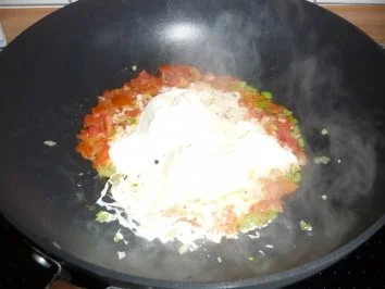 Pangasiusfilet in Tomaten-Kräutersauce auf Reisbett - Rezept - Bild Nr. 4