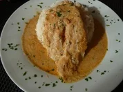 Pangasiusfilet in Tomaten-Kräutersauce auf Reisbett - Rezept