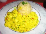 Pangasiusragout mit Ananas in einer Kräuter-Currysoße an Langkornreis - Rezept