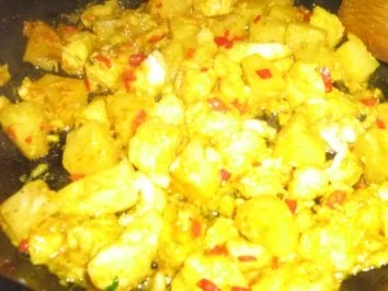 Pangasiusragout mit Ananas in einer Kräuter-Currysoße an Langkornreis - Rezept - Bild Nr. 4