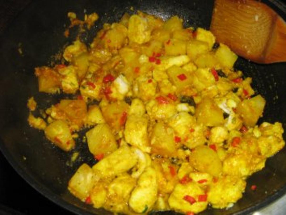 Pangasiusragout mit Ananas in einer Kräuter-Currysoße an Langkornreis - Rezept - Bild Nr. 5