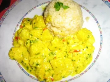 Pangasiusragout mit Ananas in einer Kräuter-Currysoße an Langkornreis - Rezept - Bild Nr. 9