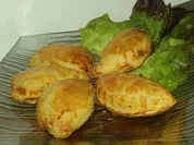 Lachsspinattaschen mit Pinienkernen. - Rezept