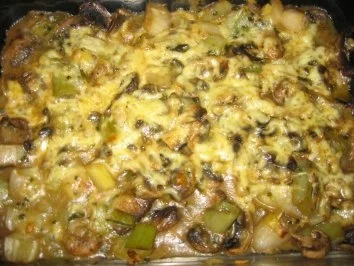 Rezept: Champignons in Käsesoße gratiniert Champignons in Käsesoße gratiniert - Rezept