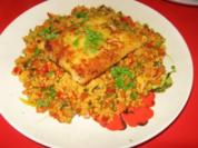 Gemüse-Couscous mit gebackenem Fischfilet - Rezept