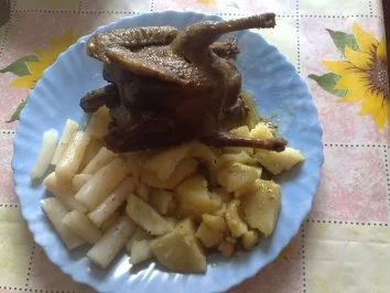 Täubchen mit Kartoffeln und Schwarzwurzeln - Rezept