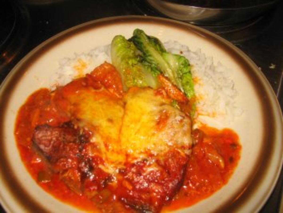 Bilder für Fleisch: Überbackene, scharfe Tomatenkotelett aus dem Ofen - Rezept
