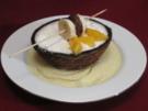 Kokosnuss-Schiffchen mit Dessertfüllung - Rezept
