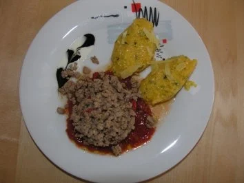 Polentanocken mit gebratnem Tatar auf kaltem Tomatenspiegel - Rezept