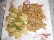 Schweinegeschnetzeltes in Paprika-Zwiebelsahne - Rezept