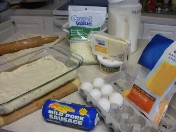 Pizza zugedeckt - Rustica - Bratwursthack mit verschiedenen Kaesen - Rezept - Bild Nr. 2