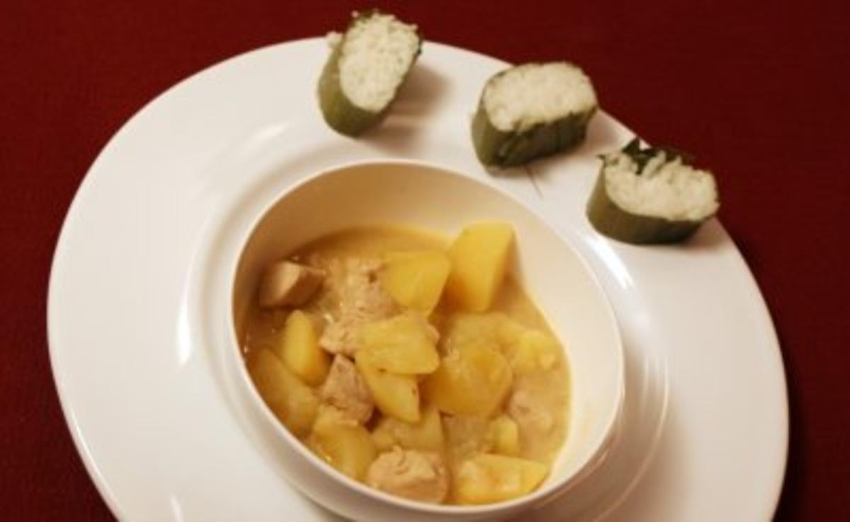 Bilder für Mildes Curry mit Hühnerfleisch, Kartoffeln und Reis im Päckchen (Stefanie Tücking) - Rezept