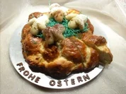 Oster-Hefeteig-Nest mit Marzipan-Lämmchen - Rezept