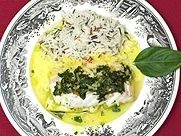 Kabeljau mit Muscheln im Pergament mit Safransoße - Rezept