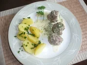 Hackbällchen in Rahmkräutersauce - Rezept