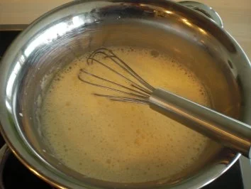 Sahneschmarren mit Amaretto und Vanille-Mango-Sauce - Rezept - Bild Nr. 3