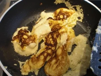 Sahneschmarren mit Amaretto und Vanille-Mango-Sauce - Rezept - Bild Nr. 7