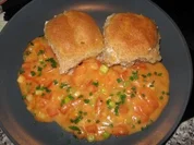 Kleine Dampnudeln mit Hähnchenfüllung und Tomatensoße "Spezial" - Rezept