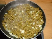 Gebratene Bohnen mit Ei - Rezept