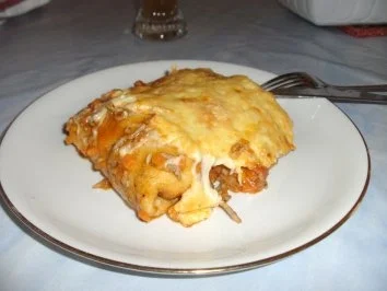 Rezept: Pfannkuchen gefüllt und überbacken Pfannkuchen gefüllt und überbacken - Rezept