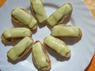 Rezept: Zwischensnack: Schinken-Käse-Bruscetta, überbacken Zwischensnack: Schinken-Käse-Bruscetta, überbacken - Rezept