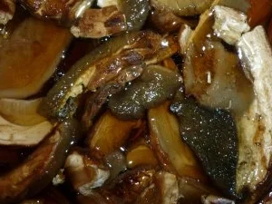 Grappa-Honig-Schweinebraten mit Steinpilz-Schalottensauce und Rucolareis - Rezept - Bild Nr. 4