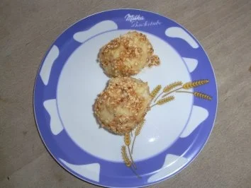 Nutella- Topfenknödel.in Haselnusskrokantmantel - Rezept