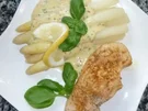 Schweinerückensteaks mit frischem Spargel und Dijon-Kräuterhollandaise - Rezept