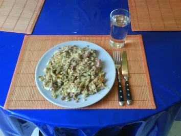 Eier: Gebratener Grünkern mit Ei und Speck - Rezept